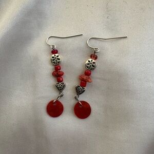 red and silver dangly earrings
